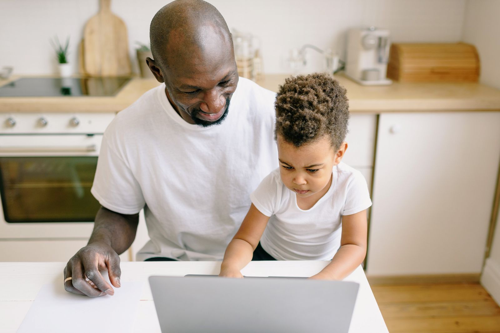 Family using a computer to check information